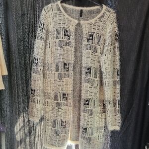 Elegant Cream and Black Women's Sweater